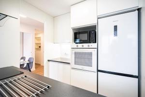 A kitchen or kitchenette at For You Rentals Cozy Apartment TEMPORAL La Vaguada Madrid PMO10