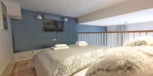 Posteľ alebo postele v izbe v ubytovaní Holiday Home Aparthotel 009 z balkonem przy plaży