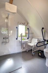 a bathroom with a sink and a toilet in a room at Finest Retreats - Humbleton Glamping in Hexham