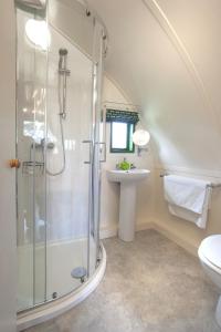 a bathroom with a shower and a sink at Finest Retreats - Barebones Glamping in Hexham