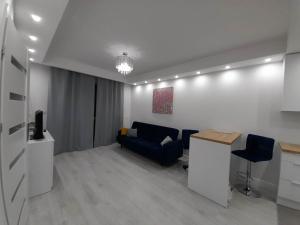 Kuchyňa alebo kuchynka v ubytovaní Welcome Apartment
