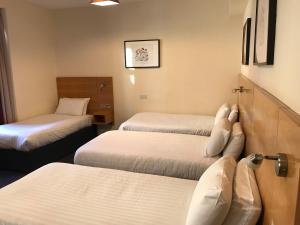 Postel nebo postele na pokoji v ubytování Stotfield Hotel