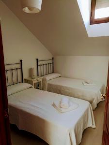 Postel nebo postele na pokoji v ubytování Balcon del olivar