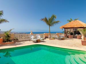 a swimming pool with a view of the ocean at Royal Garden Villas, Luxury Hotel in Adeje