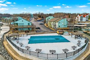 an aerial view of a swimming pool in a city at Full Moon Condo in Lake Ozark