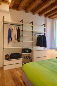 A bed or beds in a room at Dimora San Vitale - in the heart of Verona