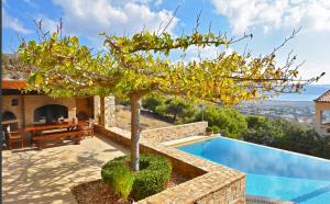 The swimming pool at or close to Luxurious Villa Dionysus with a swimming pool and sea view