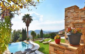 The swimming pool at or close to Luxurious Villa Dionysus with a swimming pool and sea view