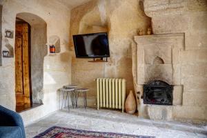 TV a/nebo společenská místnost v ubytování 4 Oda Cave House - Special Class