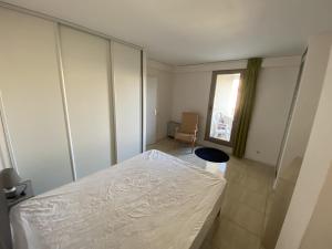 Posteľ alebo postele v izbe v ubytovaní Résidence Graziella Appartement 427