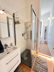 a bathroom with a shower and a sink at Kibilù - Via Taormina - Ospedale Niguarda - Isola in Milan