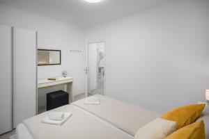 Posteľ alebo postele v izbe v ubytovaní Apartment Sea Pearl