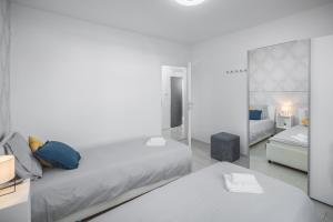 Posteľ alebo postele v izbe v ubytovaní Apartment Sea Pearl