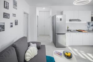 Kuchyňa alebo kuchynka v ubytovaní Apartment Sea Pearl