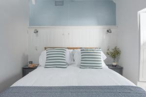 Ένα ή περισσότερα κρεβάτια σε δωμάτιο στο Newlyn Nookery