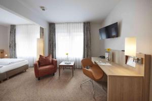 Postel nebo postele na pokoji v ubytování GHOTEL hotel & living Kiel