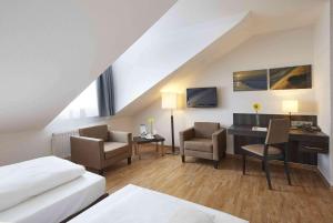 Postel nebo postele na pokoji v ubytování GHOTEL hotel & living Kiel