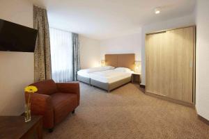 Postel nebo postele na pokoji v ubytování GHOTEL hotel & living Kiel