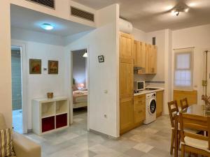 A kitchen or kitchenette at Archeros Oasis