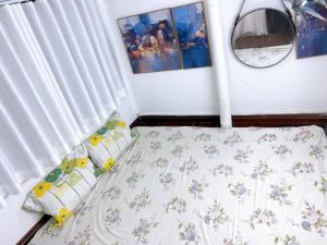 Postel nebo postele na pokoji v ubytování Fortuna Homestay