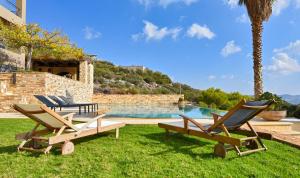 The swimming pool at or close to Luxurious Villa Dionysus with a swimming pool and sea view