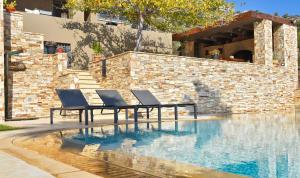 The swimming pool at or close to Luxurious Villa Dionysus with a swimming pool and sea view