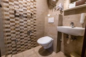 Koupelna v ubytování Hotel Oasis