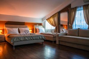 Postel nebo postele na pokoji v ubytování Hotel Oasis