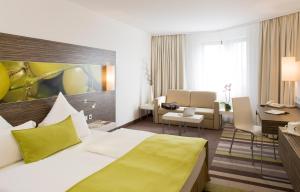 Postel nebo postele na pokoji v ubytování Mercure Hotel Koblenz