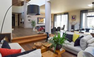 A seating area at Luxurious Villa Dionysus with a swimming pool and sea view