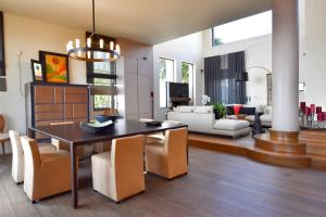 A seating area at Luxurious Villa Dionysus with a swimming pool and sea view