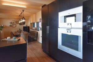 A kitchen or kitchenette at Luxurious Villa Dionysus with a swimming pool and sea view