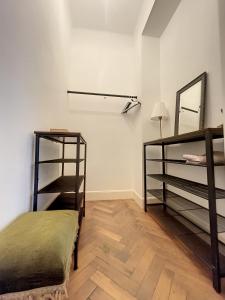 Letto o letti a castello in una camera di Cosy Apartment Brussels - Champ de Mars