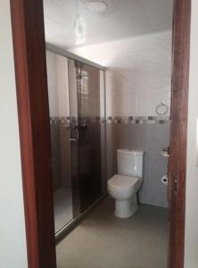 Een badkamer bij Dormitorio en un departamento compartido