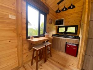 Kuchyň nebo kuchyňský kout v ubytování El Hostel Granjero