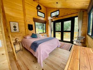 Postel nebo postele na pokoji v ubytování El Hostel Granjero