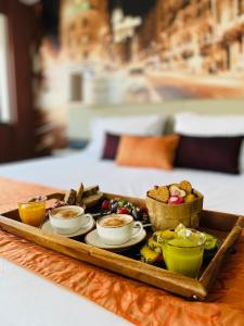 a tray of food on top of a table at Hotel Indigo Madrid - Gran Vía by IHG in Madrid