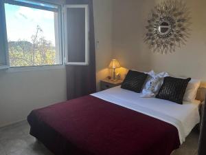 A bed or beds in a room at Chrispa's House