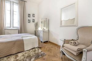 Postel nebo postele na pokoji v ubytování Casa nei pressi del Duomo,Firenze centro storico