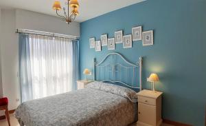Postel nebo postele na pokoji v ubytování Apartamento con vistas, ascensor y parking en Portosín
