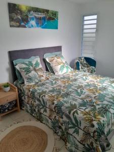 Ένα ή περισσότερα κρεβάτια σε δωμάτιο στο Appartement Seaside +2 φωτογραφίες