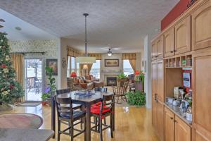 a kitchen and living room with a table and chairs at Serene Dayton Vacation Rental with Large Yard! in Dayton