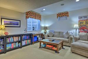 a living room with a couch and a table at Serene Dayton Vacation Rental with Large Yard! in Dayton