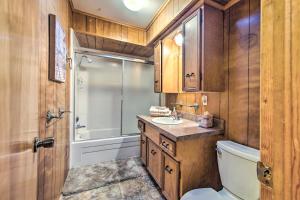 a bathroom with a toilet sink and a shower at Waterfront Home with Boat Dock in Gun Barrel City in Gun Barrel City +37 photos