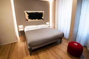 Postel nebo postele na pokoji v ubytování LUCRINO 45 by Ale