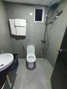 Koupelna v ubytování Tour Inn