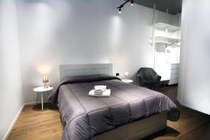 Postel nebo postele na pokoji v ubytování Business Home Via Isonzo B&B