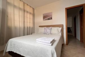 Posteľ alebo postele v izbe v ubytovaní Hermoso y Confortable piso