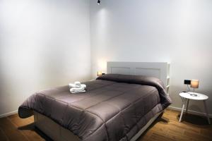 Postel nebo postele na pokoji v ubytování Business Home Via Isonzo B&B
