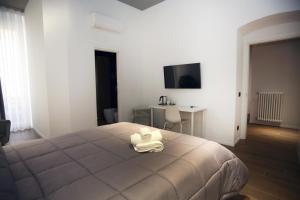 Postel nebo postele na pokoji v ubytování Business Home Via Isonzo B&B